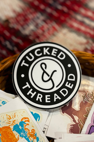 Tucked & Threaded Logo Sticker