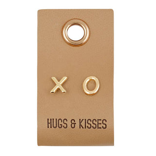 X O Gold Stud Earrings on Leather Tag