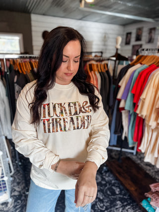 Tucked & Threaded Unisex Long-Sleeve Tee