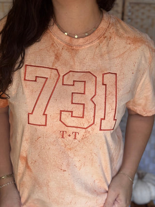 731 Area Code Colorblast Orange Unisex Tee - Tucked & Threaded