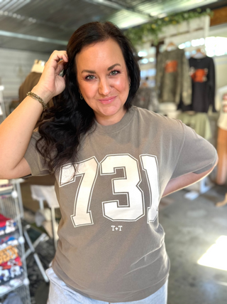 731 area code tee in taupe brown color worn by female model in her she-shed