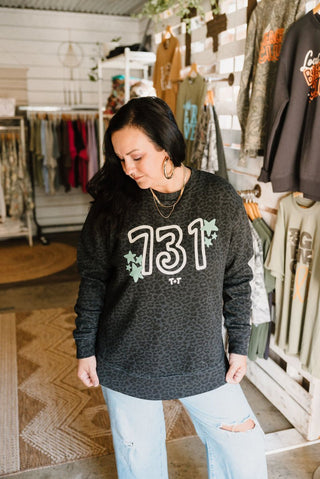 731 Funky Stars Black Leopard Scoop Hem Sweatshirt for Women - Tucked & Threaded