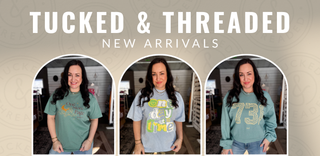 Three women wearing teal t-shirts with text, set against a beige background with 'Tucked & Threaded' branding.