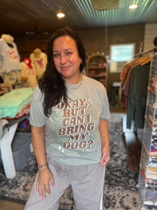 Woman wearing a t-shirt with text in a store setting