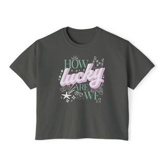 Gray t-shirt with 'How lucky are we' text design on a white background