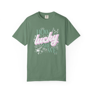 Green t-shirt with 'How lucky are we' text design on a white background