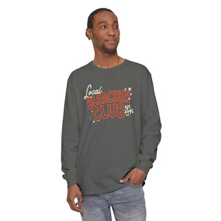 mock up of a long sleeve grey graphic tee on a male model that reads "local bleacher club" in orange and white ink