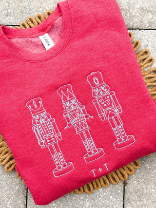 Nutcracker Trio Embroidered Red Unisex Sweatshirt - Tucked & Threaded