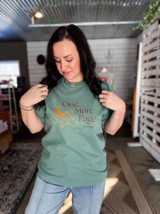 One More Page. Promise. Unisex Tee - Tucked & Threaded