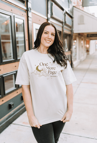 One More Page. Promise. Unisex Tee - Tucked & Threaded
