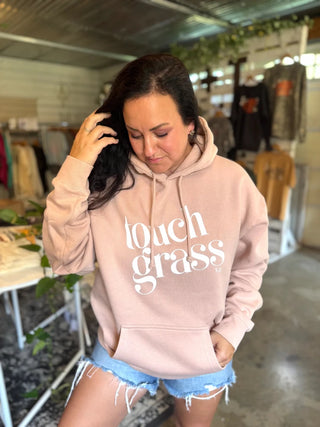 Touch Grass Blush Hoodie | Women's Outdoor Adventure Graphic Sweatshirt - Tucked & Threaded