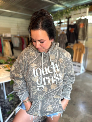 Touch Grass Camo Hoodie | Women's Outdoor Adventure Graphic Sweatshirt - Tucked & Threaded
