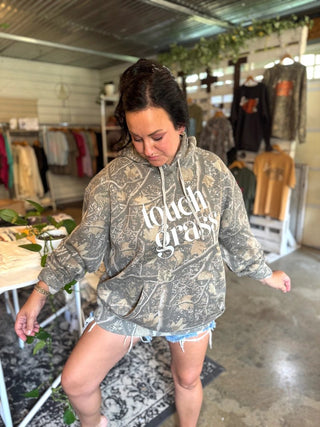 Touch Grass Camo Hoodie | Women's Outdoor Adventure Graphic Sweatshirt - Tucked & Threaded